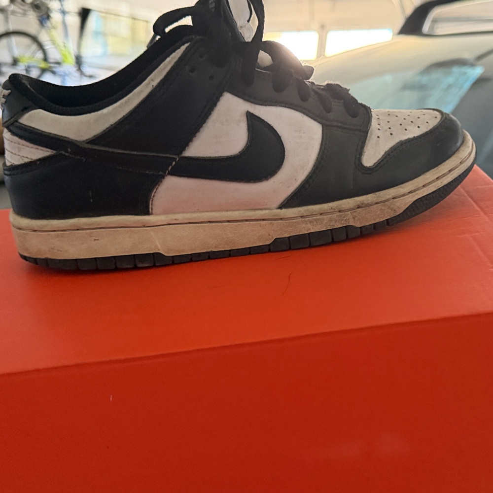 Nike Black and White Low Top Sneakers with Black Swoosh